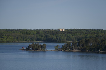 Islands in the archipelago of Stockholm with the Bogesund castle  in the background