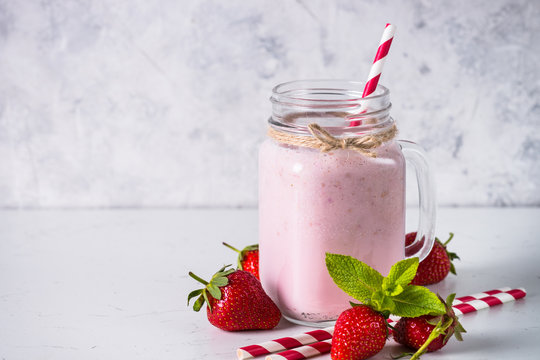 Strawberry milkshake or smoothie.