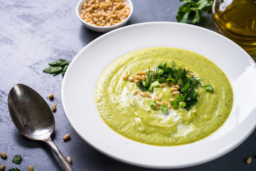 Cream soup with zucchini, herbs and cream.