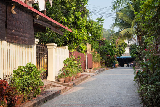 Idyllic side street in Luang Prabang, Laos, on a sunny day.
