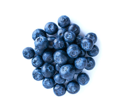 Blueberries pile isolated on white background. fresh bilberry closeup