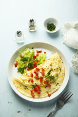 Omelette with herbs and vegetables
