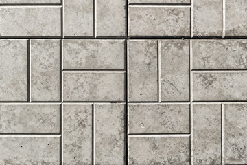 Obraz premium Pavement. Sidewalk tile background. Pavement tile. Top view. Closeup. Footpath. Sidewalk