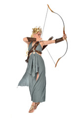 full length portrait of pretty blonde lady wearing fantasy toga gown,  and holding a bow and arrow. standing pose on white background. © faestock