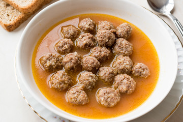 Turkish food Sulu Kofte / Juicy Meatballs Soup with Bread.