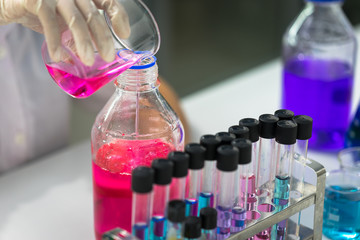 Scientist doing chemical test in laboratory