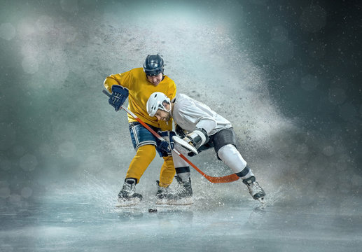 Caucassian ice hockey Players in dynamic action in a professional