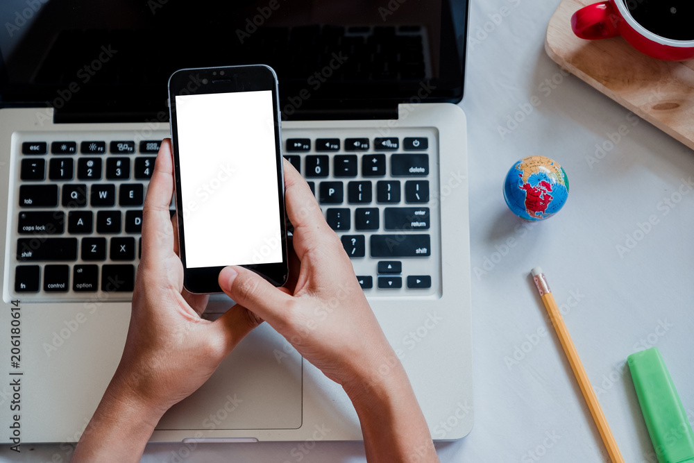 Aufkleber woman relaxing while using smartphone blank screen for graphics display montage. over the shoulder v
