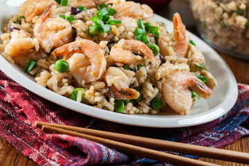 Fried rice with shrimp and vegetables served on a plate