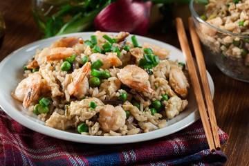 Fried rice with shrimp and vegetables served on a plate