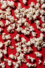 Popcorn on red background, pop contemporary style