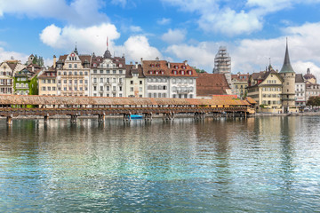 Fototapeta na wymiar View of the old wooden bridge Capelbrucke in Lucerne.