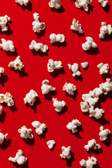Popcorn on red background, pop contemporary style
