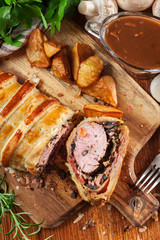Pork tenderloin in wellington style in puff pastry