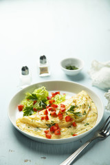 Omelette with herbs and vegetables