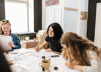 Lecture and training in calligraphy office for a group of people.