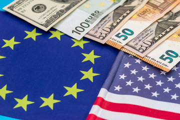 dollar and euro banknotes on national flag