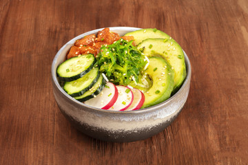 Hawaiian tuna poke salad with wakame and copy space