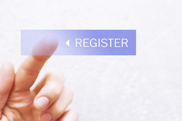 Register - finger pressing blue transparent button on interface with light beige background. Technology, internet and networking concept.