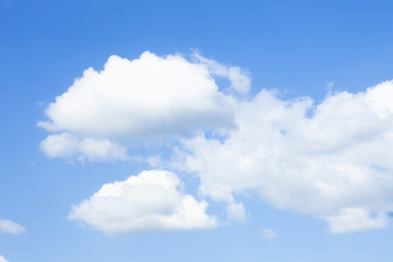 Background of Blue Sky with White Cumulus Clouds.