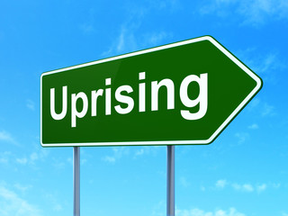 Political concept: Uprising on green road highway sign, clear blue sky background, 3D rendering