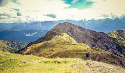 Geogria., Lonley men in Caucasus Mountains. Adorable high mountain peaks. Svaneti, Geogria.