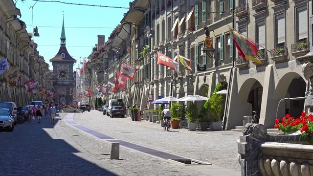 BERN, SWITZERLAND - JULY 06, 2017: View of The Kramgasse in Bern, Switzerland. Kramgasse is part of the World Cultural Heritage of UNESCO.
