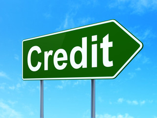Currency concept: Credit on green road highway sign, clear blue sky background, 3D rendering
