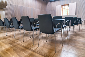 Naklejka na ściany i meble Row of chairs on a modern meeting room