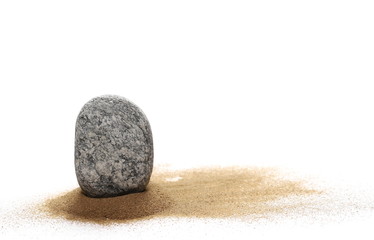 Sea stone in sand pile isolated on white background