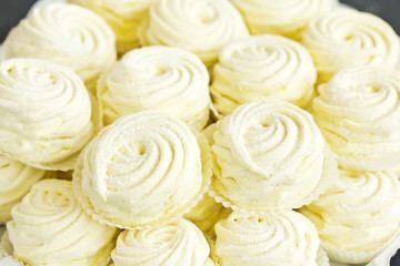 Homemade marshmallows with fresh berries.