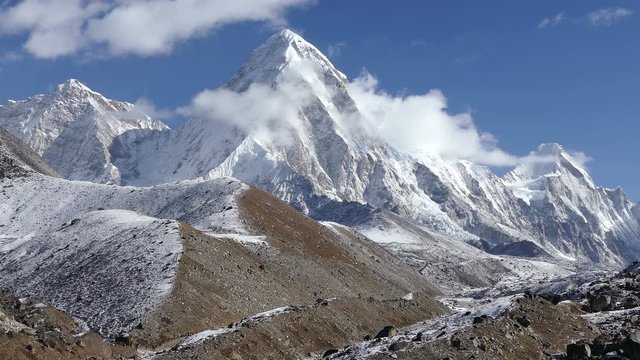 Magnificent view of Pumo Ri peak (7161m) at sunrise. Nepal, Himalaya mountains. Time Lapse.