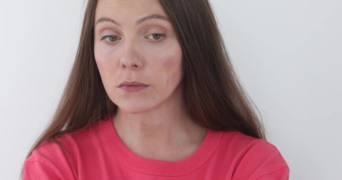 Emotional girl shows gesture grief