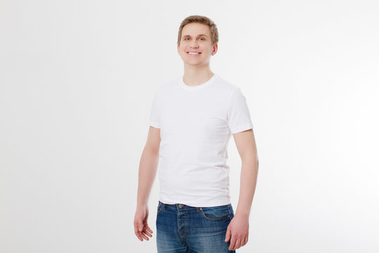 Front view. Young man wearing blank white t-shirt isolated on white background. Copy space. Place for advertisement