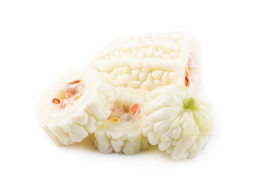 White bitter melon and slice isolated on a white background