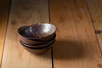 Ceramic Tableware Set on a wooden background