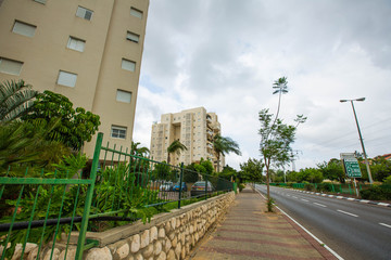Fototapeta na wymiar RISHON LE ZION, ISRAEL -MAY 7, 2018: High residential building in Rishon Lezion, Israel.