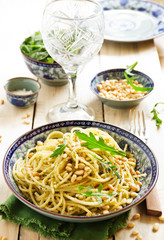 Spaghetti with pesto of arugula with pine nuts