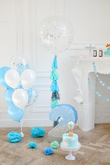 Two years birthday decorations. Decorations for birthday party. Blue and white balloons. 