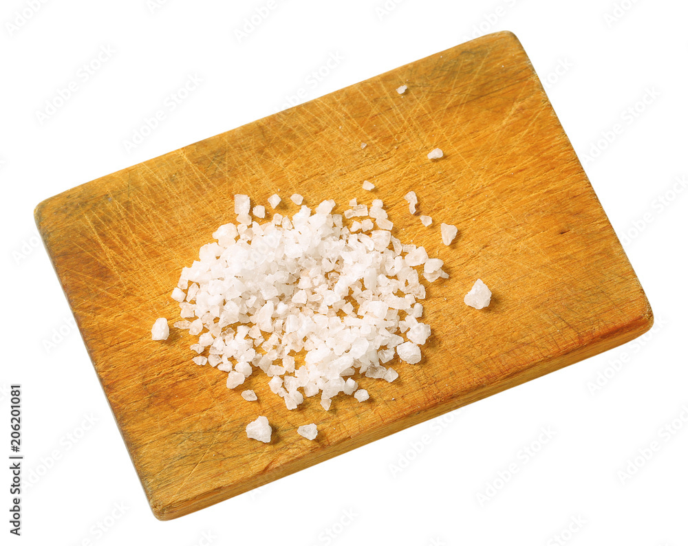 Poster Coarse sea salt on cutting board