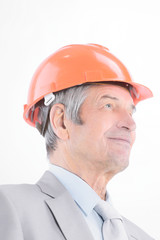closeup.portrait of confident senior engineer .isolated on a white
