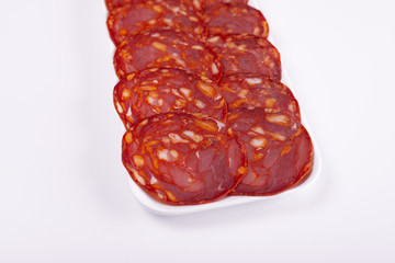 Chorizo made with pork on white background. Isolated. Copy space.