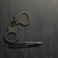 set of knife and handcuff