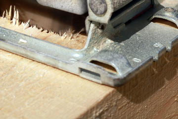Electric circular saw for a wood cut.