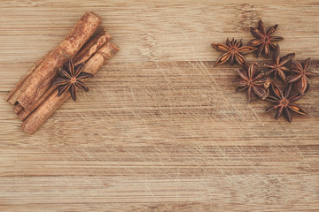 cinnamon and star anise on a wooden board