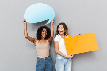 Portrait of two cheerful young women