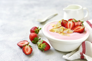 Natural strawberry yogurt with fresh berry.