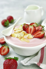 Natural strawberry yogurt with fresh berry.