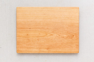 Cherry wood cutting board on linen, handmade wood cutting board	
