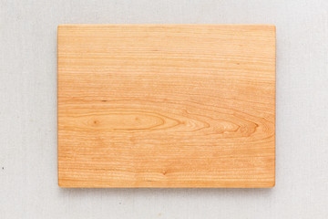 Cherry wood cutting board on linen, handmade wood cutting board	